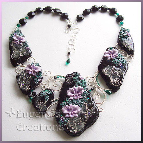 One-of-a-kind necklace with hand-sculpted orchids
